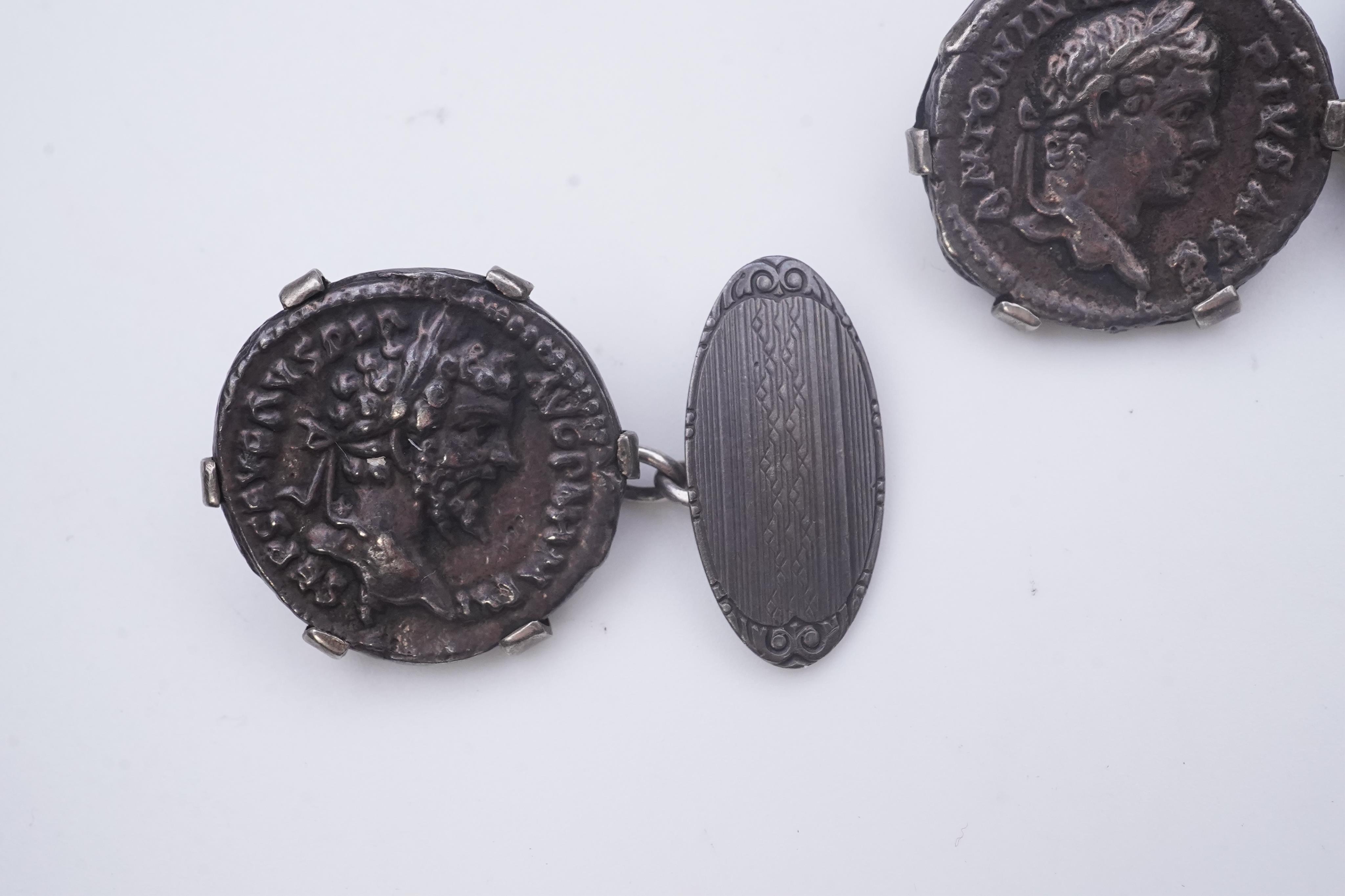 A pair of coin cufflinks